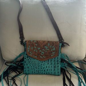 Leather and turquoise purse